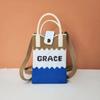 Bolso para teléfono móvil de alta gama Ins Nuevo Bolso tejido casual para mujer Bolso de mano Moda Versátil Tejido Popular Bolso cuadrado pequeño