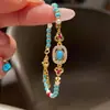 Pulsera Elástica de Cuerda con Imitación de Turquesa Estilo Étnico Nuevo Estilo Chino Pulsera de Perlas Blancas Diseño Sencillo de Nicho Joyería de Mano