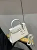 Bolso de Alta Gama de la Fábrica Original, Bolso Tipo Kelly para Mujer, Nuevo Estilo de Moda 2026, Bolso Pequeño de Hombro Cruzado