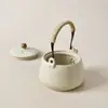Tetera de Cerámica Ru Kiln con Esmalte Agrietado Anti-quemaduras, Tetera Azul y Blanca con Asa de Flor de Loto para Uso Doméstico, Venta al por Mayor Logo Personalizado