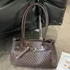 Nova bolsa de palha tecida casual para o dia a dia para mulheres, bolsa de ombro de grande capacidade, bolsa de mão simples e versátil estilo coreano para o trabalho