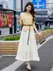 Conjunto de Traje para Mujer para Primavera y Otoño 2026, Nuevo Estilo de Primavera, Elegante y a la Moda, Tendencia, Conjunto de Dos Piezas con Chaqueta Pequeña y Falda con Cinturón