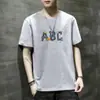 Camiseta Masculina de Verão Nova 2024 Solta Manga Curta Gola Redonda Casual Base Fina Tendência