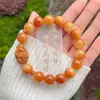 Agita las explosiones de sonido corazón material viejo pulsera de bodhi nube de fuego cuentas redondas doble círculo texto jugar cuentas de mano venta directa de fábrica
