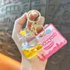 Llavero Creativo de Taza de Té con Leche y Frutas Rellenas de Aceite Colgante Lindo de Arena Movediza Líquida Accesorios para Bolsos Grabber Regalo al por Mayor