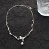 Collar retro exquisito con borla de perlas y mariposa para mujer, diseño de nicho de alta gama, elegante, simple, de lujo ligero, artístico, cadena para suéter