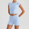 Conjunto de Sutiã Esportivo de Manga Curta com Gola Halter e Bolso para Corrida e Yoga Calça Longa e Curta para Mulheres