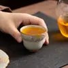 Taza de té de cerámica Ru kiln con flor de cerezo pintada a mano, taza de maestro, taza individual para juego de té kung fu, taza de té de alto valor estético para uso doméstico