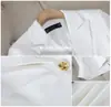 Venta al por mayor transfronteriza de nuevo blazer negro de manga larga para otoño e invierno para mujer, traje profesional con pantalones acampanados conjunto de dos piezas