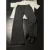 Directo de fábrica, pantalones transpirables estilo retro americano con patrón de espinas, pantalones fluidos para hombre, pantalones deportivos casuales de pierna recta para primavera y otoño