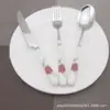 Talheres de aço inoxidável cabeça redonda cabo de cerâmica faca de comida ocidental, garfo e colher três peças de louça de cerâmica vendas diretas da fábrica