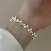 Pulsera de perlas barrocas de agua dulce en forma de pétalo para mujer, pulsera de cuentas de nicho de lujo ligero con un toque de alta gama, venta al por mayor