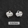 Colgante de aleación con forma de corazón hueco y cruz, color plata antiguo, accesorios para joyería DIY, materiales para colgantes de pulsera y collar