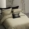 Nuevo juego de cuatro piezas de jacquard hueco de algodón-lino Tencel de alta precisión y lujo sutil, juego de ropa de cama premium para regalo con funda de edredón
