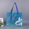 Saco de tote a laser saco de presente mágico personalizado TPU saco plástico transparente colorido PVC saco de tote laser