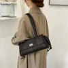 Bolso de mujer con patrón de rombos, nuevo modelo de otoño 2026, bolso de nicho de lujo ligero de alta gama para el día a día, bolso de hombro y axila de gran capacidad