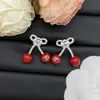 2025 Nuevo Modelo Huajia Versión de Alta Gama Pendientes en Forma de V con Diamantes Rojos Cereza para Mujer, Collar de Lazo de Lujo al por Mayor