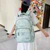 Mochila escolar de estilo coreano de alto valor estético para mujer, nuevo modelo 2026, mochila de gran capacidad para estudiantes de secundaria y preparatoria, mochila casual ligera para exteriores
