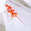 Fruta do Azevinho Fa Cai Guo Fruta Vermelha Flor de Ano Novo Balde de Flores Material Decoração Festival da Primavera Flor Artificial Flor Falsa Atacado