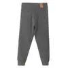 Joelheiras de camada dupla calças quentes infantis espessadas uniforme escolar de aluno do ensino fundamental essencial outono e inverno meninos e meninas camada base de uso interno classe A calças