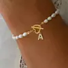 Pulseira Geométrica Europeia e Americana com Fivela Ot Transfronteiriça, Contas de Pérola Frescas e Simples com Pingentes de 26 Letras, Joias Modernas Femininas