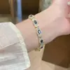 Anillo Retro Diamante Completo Nicho de Alta Gama Pulsera Tesoro Color Esmeralda Combinación Total Pulsera de Zirconia Pulsera de Diamantes Delicada