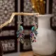 Aretes de Pavo Real Cloisonné Imitación Totem Minoría Miaoli Fénix Aretes de Campana Punto Escénico Aretes Calientes