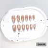 24 PIEZAS Colección de Arte para Uñas Bestseller Transfronterizo Navidad Halloween Flor Uñas Portátiles Ojo de Gato Halloween Piezas de Uñas Portátiles