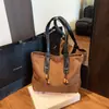 Yue Zi 2026 Otoño Temprano Nuevo Commute Color Sólido Mujer Retro Popular Moda Textura Casual Bolso Tote de Hombro Único
