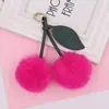 Lindo Colgante de Llave de Bola de Pelo de Fruta Cereza Peluda Colgante Creativo para Bolso de Peluche Accesorios de Bola de Pelo de Conejo Rex de Imitación Venta al por Mayor