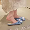 Pantuflas poco profundas de estilo francés con lazo y punta redonda para mujer, moda versátil vintage de primavera 2026, mules de punta cerrada