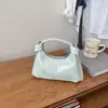 Bolso de mano tipo hobo con asa retorcida único para mujer, nuevo bolso cruzado versátil de verano 2026, minibolso de mano para el trabajo