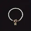 2025 Moda Nueva Transfronteriza Pulsera de Letras Inglesas Cobre Incrustado Circonita Oval Perla de Imitación Pulsera de Perlas al por Mayor