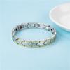 Europa y Estados Unidos ventas calientes moda personalidad entre oro imán titanio germanio acero inoxidable pulsera regalo pareja pulsera acero titanio