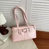 Bolso de hombro individual moderno y elegante para el trabajo 2026 Otoño nuevo bolso para mujer casual versátil color liso textura simple bolso de axila