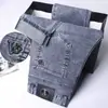 Jeans Elásticos de Verano Ajustados Versátiles de Pierna Recta 2026 Nuevos de Verano Finos de Moda para Hombre Pantalones Largos Casuales para Hombre