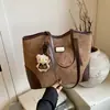 Bolsa Transfronteriza de Gran Capacidad para Mujer 2026 Nuevo Estilo Otoño e Invierno de Gama Alta Versátil Bolso Tote de Hombro para Viajes Diarios Estudiantes Universitarios