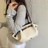 Tendencia coreana bolso versátil de nicho de un solo hombro bolso de mano diario para mujer nueva moda 2026 simple de verano tipo tote diario atmosférico