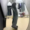 Jeans Bootcut de Cintura Alta Retrô para Mulheres no Verão Novo Tamanho Grande mm Gordas Efeito Emagrecedor Calças Flare em Formato de Ferradura Elásticas com Laço