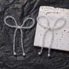 Cristal de color mágico simple perla de cristal lazo diy tejido a mano clip para el pelo de cuentas accesorios para el cabello pendientes material venta al por mayor