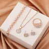 Venta Caliente Transfronteriza Lujo Ligero Geometría de Diamante Collar Anillo Pendientes Juego de 4 Piezas Joyería Moda Joyería Versátil Traje