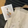 Elegante y versátil nuevo chaleco de estilo chino, nuevo modelo primavera 2026, chaleco exterior sin mangas con cuello en V de estilo nacional