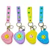 Bolsa de Monedas de Silicona de Dibujos Animados Creativos Bolsa para Auriculares Colgante para Llavero Venta al por Mayor Mini Bolsa Colgante para Llavero