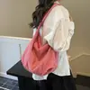 Primavera de 2026 Novo Estilo Simples Xadrez Preto Popular Bolsa de Mão Algodão Bolha Bolsa Tote Feminina Capacidade Extra Grande