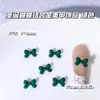Las Decoraciones para Uñas de Aleación con Temática Navideña Son un Éxito de Ventas Transfronterizo, Incluyendo Rojo Ancla, Verde Navidad, Calcetines Lindos y Decoraciones de Uñas de Bastón
