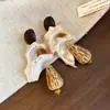 Pendientes de borla con carcasa de madera marrón transfronterizos europeos y americanos, pendientes de estilo vintage Maillard, pendientes de mujer de lujo ligero de alta gama