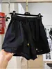 Shorts de Pierna Ancha Huecos con Cordón de Color Sólido Retro Americano Verano Temperamento de Alta Gama Holgados Adelgazantes Versátiles Pantalones Casuales