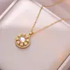 Collar para Mujer Moda Nicho Nuevo Diseño Colgante Celebridad de Internet Flor de Zircón Bauhinia Giratoria Temperamento Collar de Acero Titanio