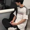 Camiseta Pesada de Manga Curta para Homens, Marca Europeia e Americana Tendência, Verão Estilo Americano Esportivo Gola Pequena Top Solto de Manga Três Quartos para Casais