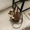 Bolso Cubo Retro para Mujer 2025 Invierno Nuevo Bolso Tote Coreano Simple Gran Capacidad Hombro Único Cruzado Bolso de Moda